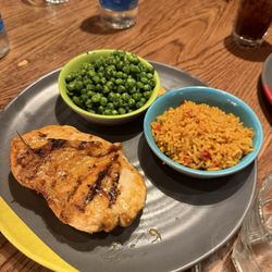 Nando's - Chicken butterfly with peas and spicy rice