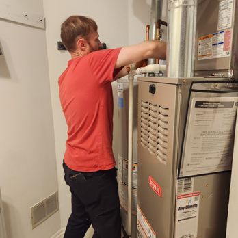 Excel Plumbing - Denny getting close to finishing the installation of a new 50 gallon water heater - Plumbing Near Me - Wheeling, Illinois