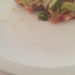 Red hair in my pizza! It was in the actual pizza bread!