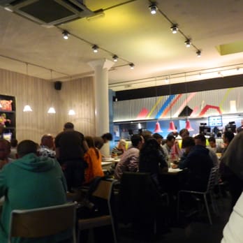 Wahaca - Ground floor looking towards the open kitchen - Mexican Near Me - London, XGL Wahaca - Ground floor looking towards the open kitchen - Mexican Near Me - London, XGL