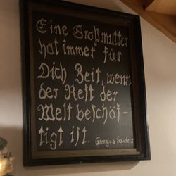 Gaststätte Oma - Sign on wall about grandmas