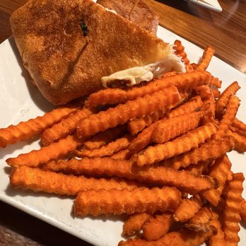 Slippery Otter Pub - Italian sandwich with sweet potato fries - Pubs Near Me - West Yellowstone, Montana