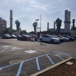 20 Tesla Superchargers at the Southwest corner of Arroyo Parkway and East Glenarm St.