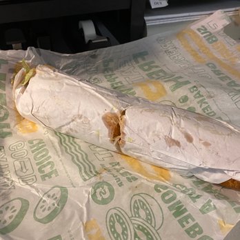 Subway - a burrito wrapped in paper and sitting on a counter - Sandwiches Near Me - New Haven, Michigan