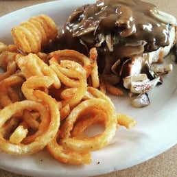 Smothered burger and curly fries