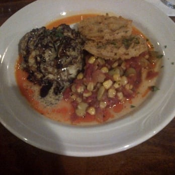 The Smithfield Inn Restaurant & Tavern - Ultimate Crab Cake with fried green tomatoes and succotash. - Bed & Breakfast Near Me - Smithfield, Virginia The Smithfield Inn Restaurant & Tavern - Ultimate Crab Cake with fried green tomatoes and succotash. - Bed & Breakfast Near Me - Smithfield, Virginia