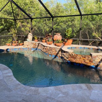 Pool Works - a view of a pool and patio - Pool & Hot Tub Service Near Me - Parrish, Florida Pool Works - a view of a pool and patio - Pool & Hot Tub Service Near Me - Parrish, Florida