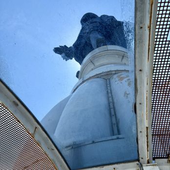 City Hall - Up-top view of the bronze statue of William Penn on top of City Hall (founder of Pennsylvania and Philadelphia) - Landmarks & Historical Buildings Near Me - Philadelphia, Pennsylvania City Hall - Up-top view of the bronze statue of William Penn on top of City Hall (founder of Pennsylvania and Philadelphia) - Landmarks & Historical Buildings Near Me - Philadelphia, Pennsylvania