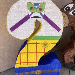 Mundo de Karamelo - Buzz and woody piñata