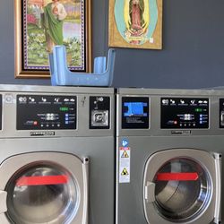 Suds and Bubbles Laundry Services - No tap accepted and pagan idols on walls.
