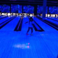 Strikes Unlimited - Leanna dancing at Glow Bowl