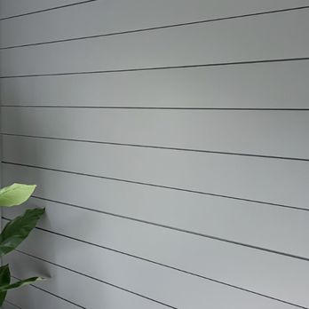 Pantheon Woodworks - Custom shiplap wall with baseboards and paint - Carpenters Near Me Pantheon Woodworks - Custom shiplap wall with baseboards and paint - Carpenters Near Me