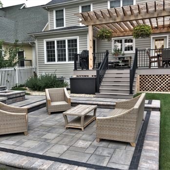 CMS Landscapes - a patio with a pergolated roof - Landscaping Near Me - Downers Grove, Illinois