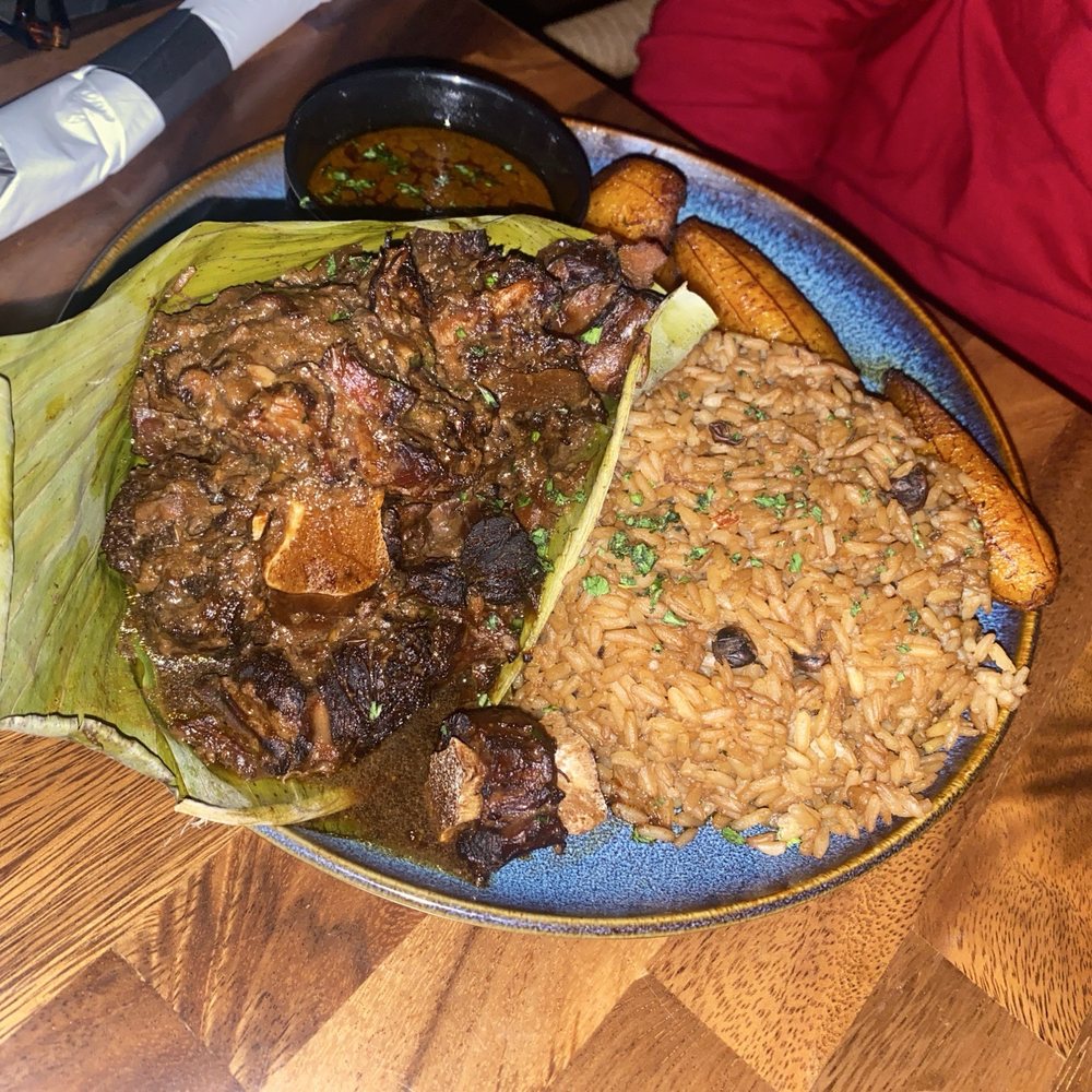Bacchanal Junction - Stew Oxtail w/Plantain - Bars Near Me - Bloomfield, New Jersey Bacchanal Junction - Stew Oxtail w/Plantain - Bars Near Me - Bloomfield, New Jersey