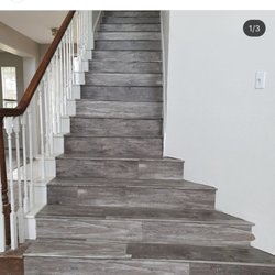 Discount Granite & Cabinets - Laminate flooring, hand scrape , scratch resistance, 25 years warranty