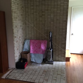 Modern Flooring Services - Fireplace area with tile on floor - Flooring Near Me - Mukilteo, Washington Modern Flooring Services - Fireplace area with tile on floor - Flooring Near Me - Mukilteo, Washington