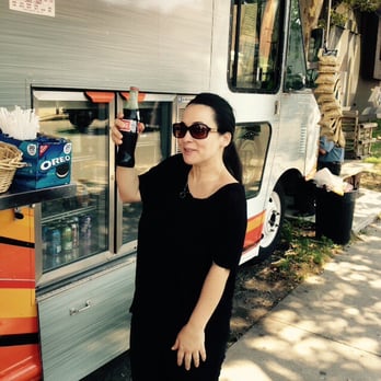 Rosie's Truck - a woman standing in front of a food truck - Food Trucks Near Me - Brooklyn, New York Rosie's Truck - a woman standing in front of a food truck - Food Trucks Near Me - Brooklyn, New York