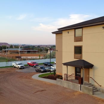 Best Western Plus Landmark Hotel - Side of hotel with view of horse arena and bluffs - Hotels Near Me - Ballard, Utah