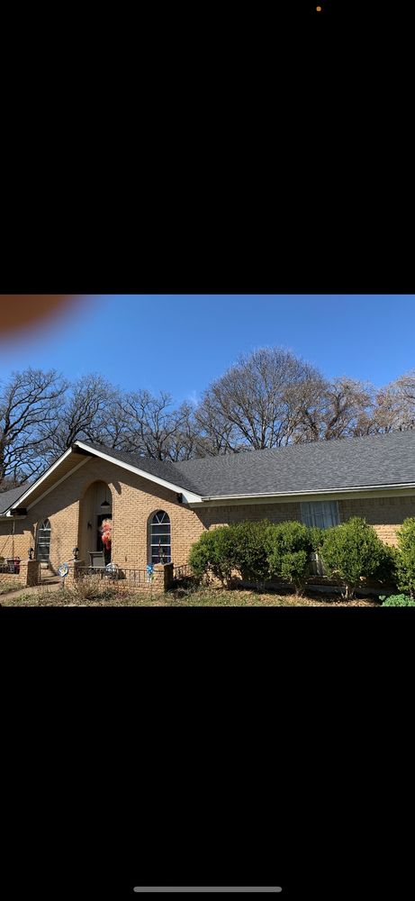 Slide of Top Dawg Roofing