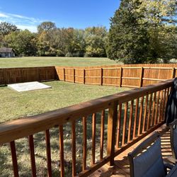 Whalen Painting and Maintenance - Backyard fence and deck