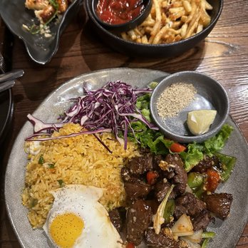 HEM Kitchen And Bar - Bo luc lac, truffle fries, mini shrimp egg rolls - Vietnamese Near Me - Houston, Texas HEM Kitchen And Bar - Bo luc lac, truffle fries, mini shrimp egg rolls - Vietnamese Near Me - Houston, Texas