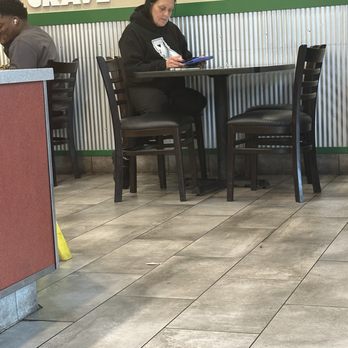 Wingstop - Employee taking seats from customers. - Chicken Wings Near Me - Redding, California Wingstop - Employee taking seats from customers. - Chicken Wings Near Me - Redding, California