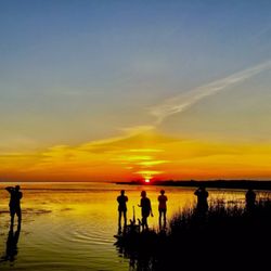 Bayou Adventure - Family enjoying the sunset on one of our recent sunset paddle excursions.