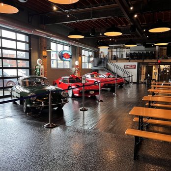 Double Clutch Brewing - a row of cars in a garage - Breweries Near Me - Evanston, Illinois