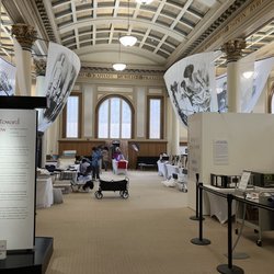 African American Museum & Library at Oakland - Setting up the doll exhibit for fundraising auction.