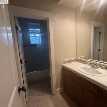 Clark Innovative - Smaller bathroom before. - General Contractors Near Me
