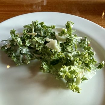 Montana Ale Works - Tender Kale Caesar, thin-cut chiffonade-style, dressed with a sprinkling of shaved hard cheese, sourdough croutons, light creamy caesar - New American Near Me - Bozeman, Montana