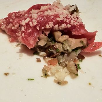 Rocca - Hidden under carpaccio is a blend of capers and mushrooms which was amazing. - Italian Near Me - Tampa, Florida