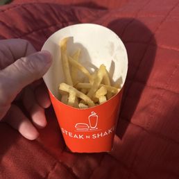 Small fries ordered with cheese sauce - Zero Cheese Sauce and apparently I only get half of my order of fries!