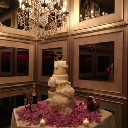 Bake Your Cakes - Elegant 5 tiered wedding cake with fresh flowers and bling.