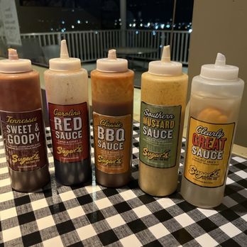Sugar's Ribs - Their home made sauce line up! - Barbeque Near Me - Chattanooga, Tennessee