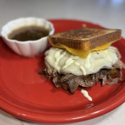 Grilled cheese French dip sandwich on millet bread