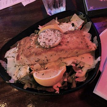 Black Market Miami - Salmon on Cesar. The herb butter on top was amazing! - Sports Bars Near Me - Miami, Florida Black Market Miami - Salmon on Cesar. The herb butter on top was amazing! - Sports Bars Near Me - Miami, Florida