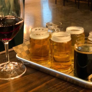 Westside Tap & Cork - a tray of beers and a glass of wine - Wine Bars Near Me - Redding, California Westside Tap & Cork - a tray of beers and a glass of wine - Wine Bars Near Me - Redding, California