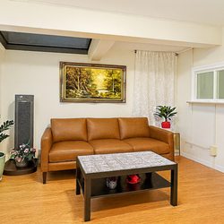Asian West Massage Therapy - Relax in our clean, welcoming lobby before your massage. A peaceful, professional space designed for comfort at AsianWest Massage.