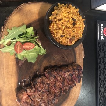 Arasibo Steak House - NY Strip medium rare with the house rub and the house rice. AWESOME!! - Steakhouses Near Me - Arecibo, Puerto Rico Arasibo Steak House - NY Strip medium rare with the house rub and the house rice. AWESOME!! - Steakhouses Near Me - Arecibo, Puerto Rico