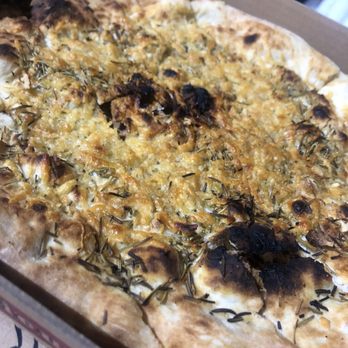 Bellatrino Pizzeria - Focaccia - it's thin crust was crispy topped with olive oil, cheese, and rosemary. You can see it got charred a little. We ate it all. - Pizza Near Me - Dallas, Texas Bellatrino Pizzeria - Focaccia - it's thin crust was crispy topped with olive oil, cheese, and rosemary. You can see it got charred a little. We ate it all. - Pizza Near Me - Dallas, Texas