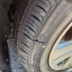 Bill’s Carwash - Large gouge on tire