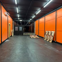 That Axe Throwing Place - Cornhole room?