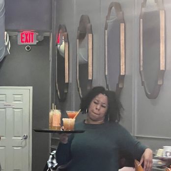 Mango Mangeaux - The hostess in the story - New American Near Me - Hampton, Virginia Mango Mangeaux - The hostess in the story - New American Near Me - Hampton, Virginia