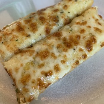 Village Pizza - Cheesy breadsticks - Italian Near Me - Eagle Mountain, Utah Village Pizza - Cheesy breadsticks - Italian Near Me - Eagle Mountain, Utah