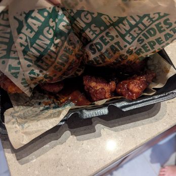 Wingstop - Never seen anyone pack wings in 4 sauces like this. Ridiculous. - Chicken Wings Near Me - Manchester, Missouri