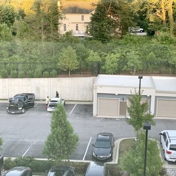 Avalon Arundel Crossing - Avalon Arundel Crossing's parking lot must double as a jiffy lube - Apartments Near Me - Linthicum Heights, Maryland