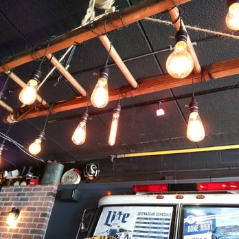 The Ladder House - Light over our table, cool pendants suspended from a ladder. - Bars Near Me - Little Chute, Wisconsin The Ladder House - Light over our table, cool pendants suspended from a ladder. - Bars Near Me - Little Chute, Wisconsin