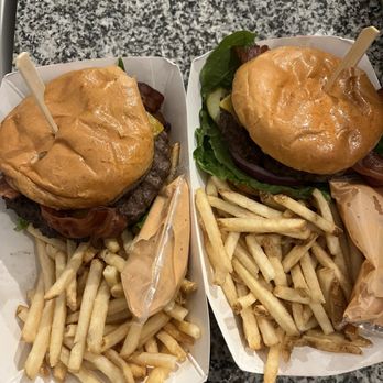 Angie’s Burger - Bacon cheeseburger and cheeseburger. Plates are larger than your normal plate, burger was huge. - Burgers Near Me - Buckeye, Arizona