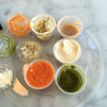 Dig Inn - All of the dressings. I LOVED the mustard dressing. Pesto was good. Orange spicy dressing is VERY spicy. Others were good but unremarkable - New American Near Me - Boston, Massachusetts Dig Inn - All of the dressings. I LOVED the mustard dressing. Pesto was good. Orange spicy dressing is VERY spicy. Others were good but unremarkable - New American Near Me - Boston, Massachusetts